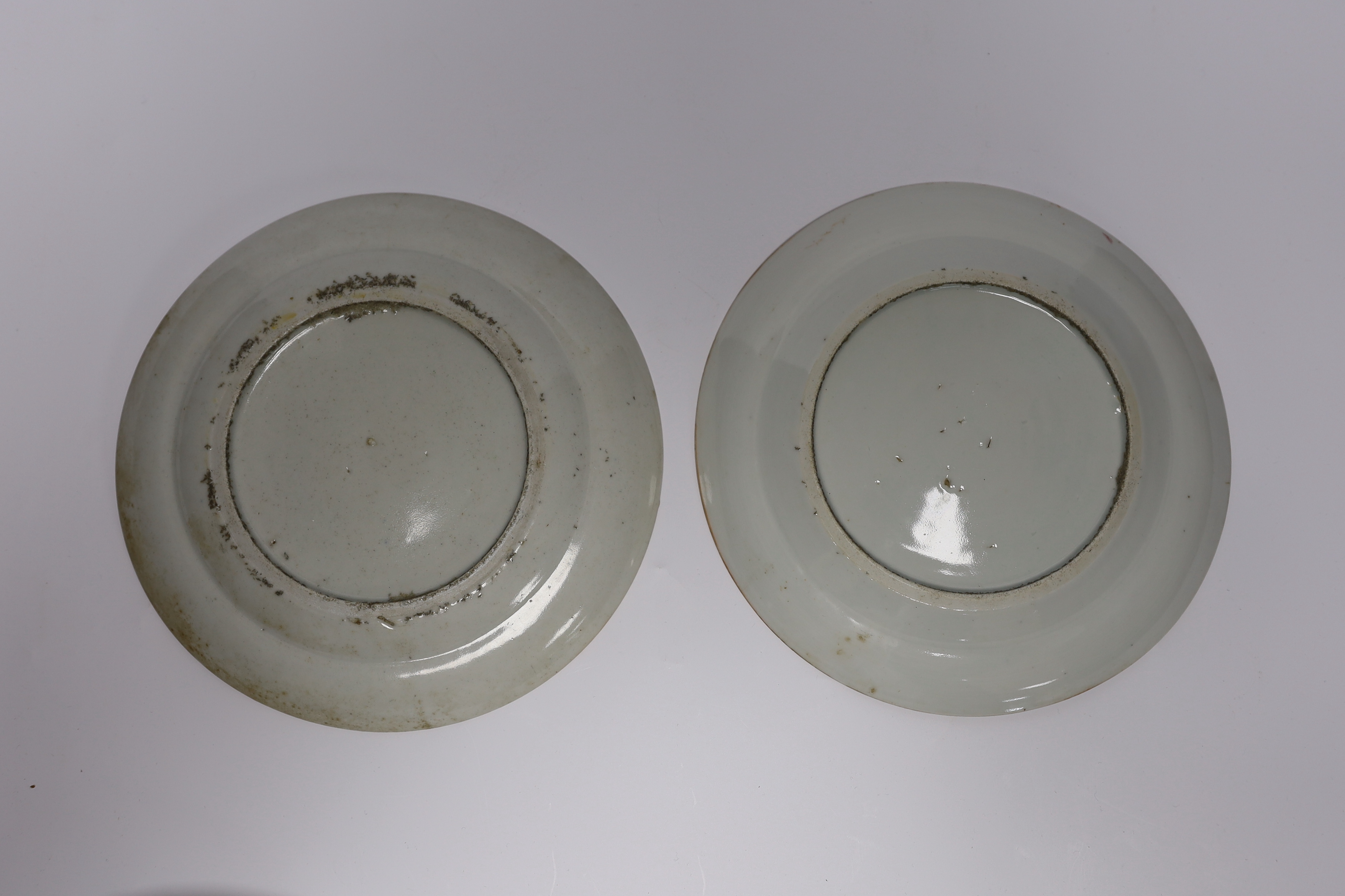 A Chinese famille noire floral dish, Qianlong mark, late 19th/early 20th century and two Chinese enamelled porcelain plates, 19th century, famille noir dish 23.5cm diameter